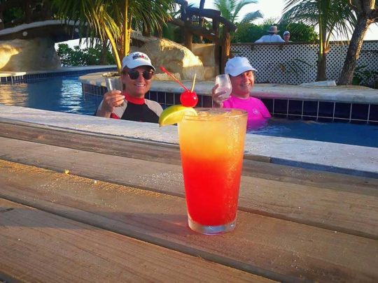 guests enjoying cocktails in the lazy river
